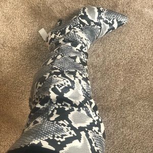 Thigh high snake boots